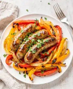 Sheet pan sausage and peppers recipe with roasted bell peppers and onions