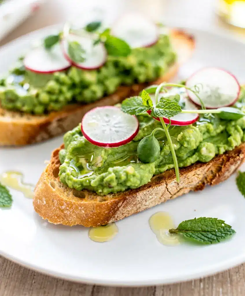 Spring pea crostini recipe with creamy spread on crispy toasted bread