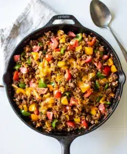 Skillet turkey taco rice with melted cheese and crispy edges close up