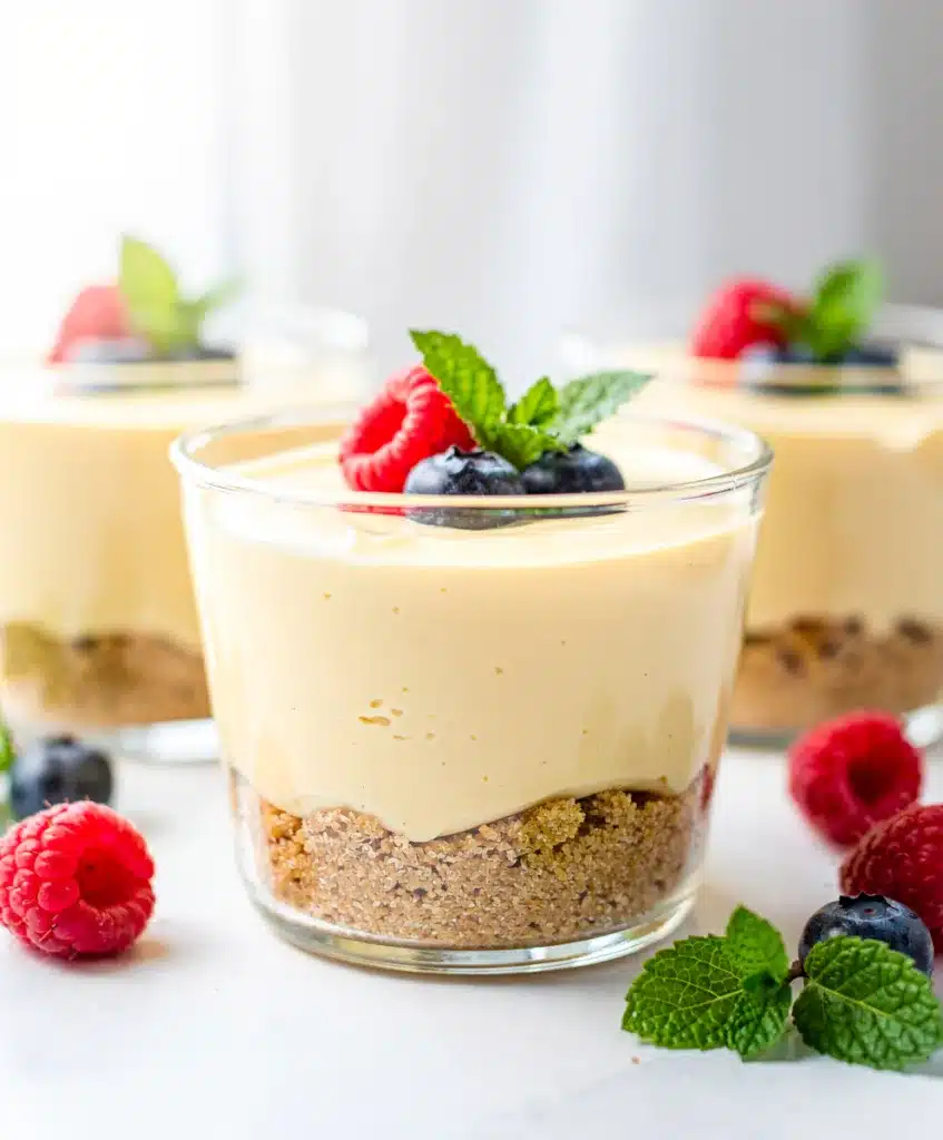 Sweet no bake cheesecake cups with creamy filling and graham cracker crust.