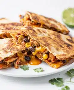 Crispy chicken black bean quesadilla with melted Monterey Jack cheese