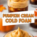 Iced cold brew coffee with creamy pumpkin foam, vibrant autumn layers