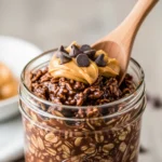 Low carb chocolate peanut butter oats in a rustic mason jar