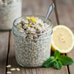 Creamy Greek yogurt lemon poppy seed oats in a rustic glass jar
