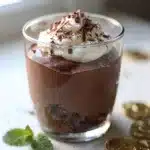 Creamy Baileys chocolate mousse dessert in a glass with mint garnish