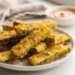 Crispy parmesan zucchini fries with herbs and creamy dipping sauce