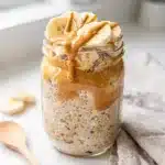 Creamy peanut butter banana overnight oats in a jar with chia seeds
