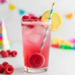 Colorful fizzy Ring Pop mocktail for kids in a tall clear glass