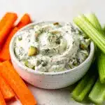 Creamy dill pickle ranch dip with fresh herbs and crunchy vegetable dippers