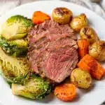 Sheet pan corned beef cabbage with roasted potatoes and carrots recipe.