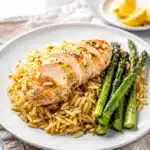 Crockpot Greek lemon chicken with garlicky orzo and vibrant roasted asparagus