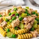Lemon pepper tuna pasta salad with peas red onion celery and creamy dressing