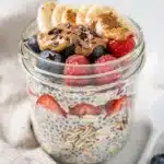Creamy overnight oats with almond butter yogurt and fresh berries for brunch.