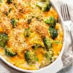 Cozy cheesy broccoli casserole with golden panko topping in a baking dish.