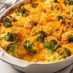 Homestyle cheesy broccoli casserole with creamy sauce and crispy topping.