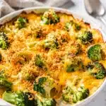 Golden brown cheesy broccoli casserole with a crispy panko Parmesan topping.