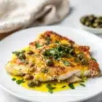 Golden pan seared chicken piccata with lemon butter sauce and capers