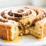Cinnamon roll cake recipe with tender swirls and sweet vanilla glaze