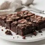 Classic fudgy brownie recipe with a crackly top and gooey chocolate interior.
