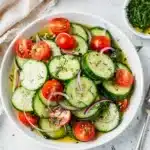 Make ahead cucumber salad recipe with crisp slices and glossy dressing