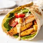 Crunchy Chicken Caesar Wrap recipe with grilled chicken and creamy Caesar dressing.