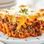 Make ahead ground beef casserole with pasta and golden cheese crust