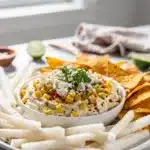 Creamy make ahead Mexican street corn dip with cotija cheese and tortilla chips