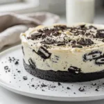 No bake Oreo cheesecake with creamy filling and crunchy cookie crust.