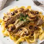 Creamy skillet beef stroganoff with tender beef and mushrooms over egg noodles