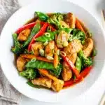 Teriyaki chicken stir fry with broccoli and peppers in glossy sauce