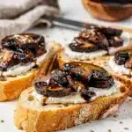 Balsamic mushroom crostini with goat cheese on toasted garlic baguette slices