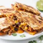 Crispy chicken black bean quesadilla with melted Monterey Jack cheese