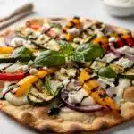 Grilled Veggie Flatbread with charred peppers and melted cheese