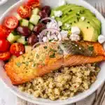 Mediterranean Salmon Bowl with creamy lemon tahini dressing close up