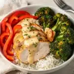 Special chicken meal prep bowls with rice broccoli avocado and feta cheese
