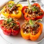 Teriyaki glazed stuffed bell peppers with creamy rice filling.