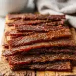 Simple beef jerky marinade recipe with soy sauce and spices in bowl