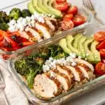 Weekly chicken meal prep bowls with quinoa, veggies, and four vibrant sauces.