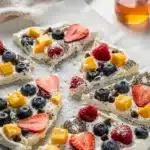 Close-up Greek yogurt fruit bark with berries and chocolate.