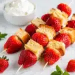Strawberry shortcake kabobs with fluffy whipped cream dipping sauce